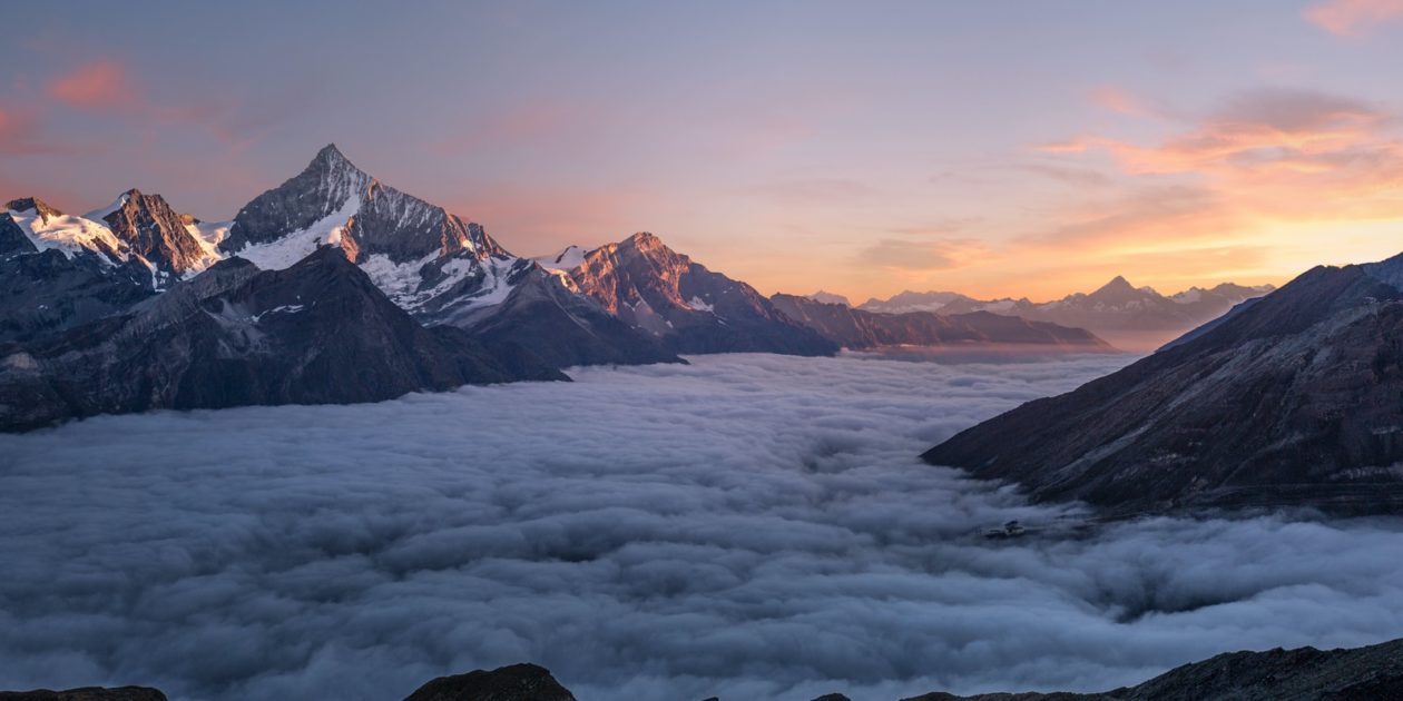 aerial photo of foggy mountains